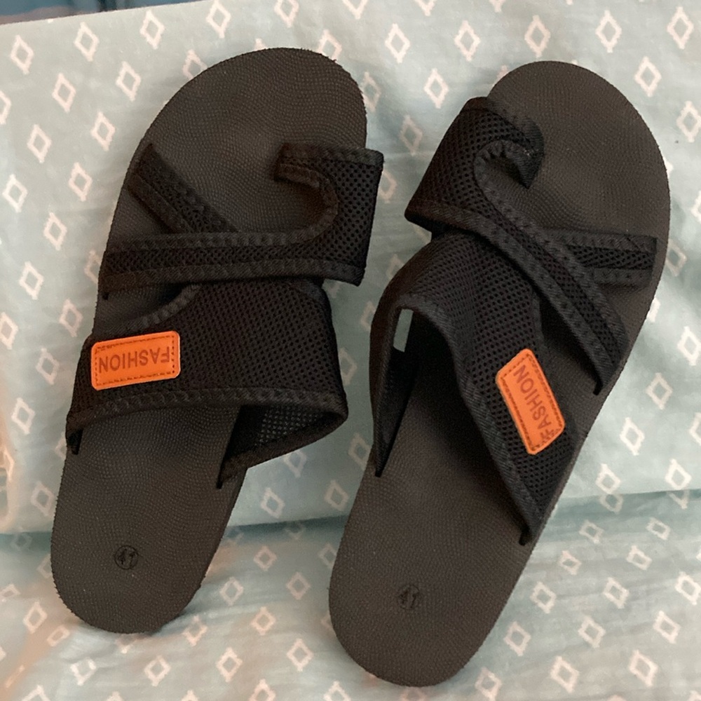 SOLD….Fashion Sandals. NWOT  Size 9 1/2 Wide. Black with mesh tops.